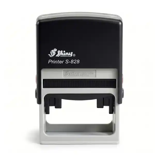Shiny S-828 - 55x32 mm. Sello automático personalizado 2 Vista frontal del sello automático Shiny Printer S-828 de 55x32 mm con carcasa negra y mecanismo de autoentintado